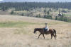 Claira Walking In Front Of Ranch