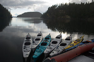 Kayaks At Sunset