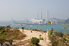 Flying Kite In Front Of Power Plant