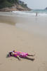 Claira Making Sand Angels