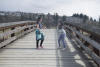 Kids Playing On Wooden Bridge