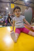 Claira Sliding Down Yellow Slide