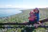 Nara And Claira Sitting On Log