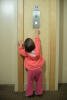 Claira Reaching For The Elevator Button