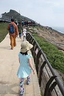 Walking On Crowded Trail At Yehliu Geopark