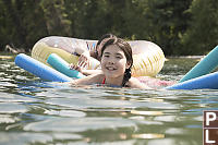 Nara Playing On Pool Floats