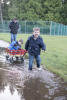 James Splashing Into Puddle