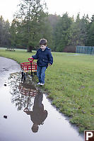 James Trying To Walk Around Puddle