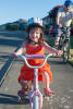 Claira Riding With Training Wheels