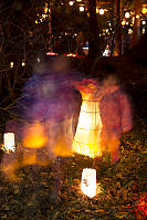 Ghostly Kids Standing Around Lanterns
