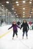 Claira And Helen Going Around Rink