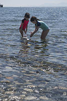 Playing With Boats In Ocean