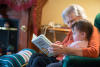 Claira And Grandma Reading ABook
