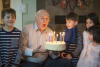 Grandpa Blowing Out His Candles