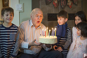 Grandpa Blowing Out His Candles