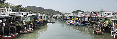 Stilt Houses With Boats From Bridge