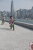 Nara Claira Biking With Two International Finance Centre