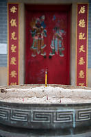 Incense Burner In Front Of Temple