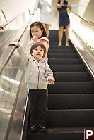 Claira Riding The Escalator