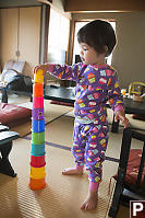 Claira Stacking Cups On Tatami Mats