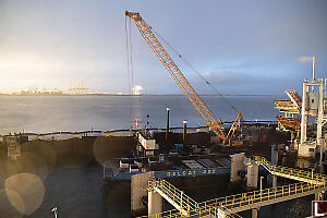 Barge And Crane In Berth One