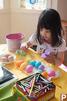 Claira Opening Easter Eggs