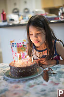 Claira Blowing Out Candles