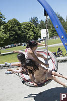 Three Girls On Disk Swing