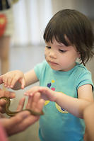 Claira Touching Garter Snake