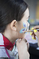 Nara Getting Butterfly Face Paint With Sparkles