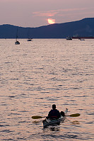 Kayaker At Sunset