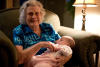 Grandma In Arm Chair With Claira