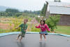 Marcus And Nara In Front Of The Barn