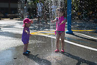 Two Girls With Spraying Water