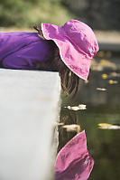 Nara Looking Into Pond