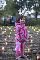 Claira Standing In Candle Lit Labyrinth