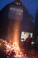 Sparks Rising From Burn Pile