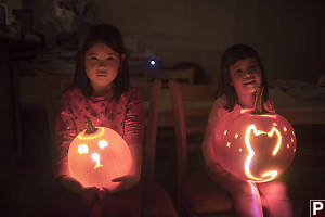 Carved Lit Pumpkins