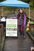 Claira With Volunteer Sign