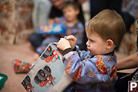 James Tearing Into Wrapping Paper