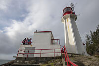 Dwarfed By Lighthouse