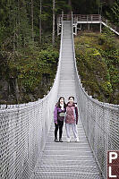 Standing On Suspension Bridge