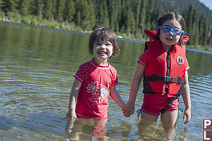 Kids Swimming In The Lake