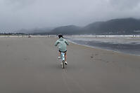 Nara Biking Into Storm