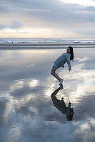 Reflection On Wet Sand