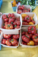 Baskets Of Small Tomatoes