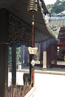 Charm On Incense In Burner