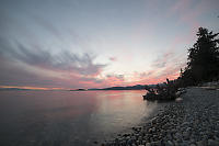 Sunset On Rocky Beach