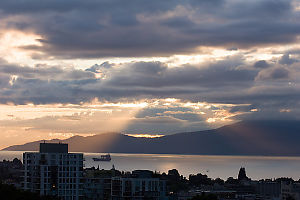 Sun Beams Through Clouds