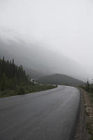 Rain Coming To Wet Road